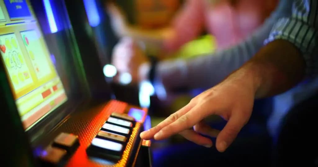 Australia’s NSW fines two venues over gaming machine shutdown breaches